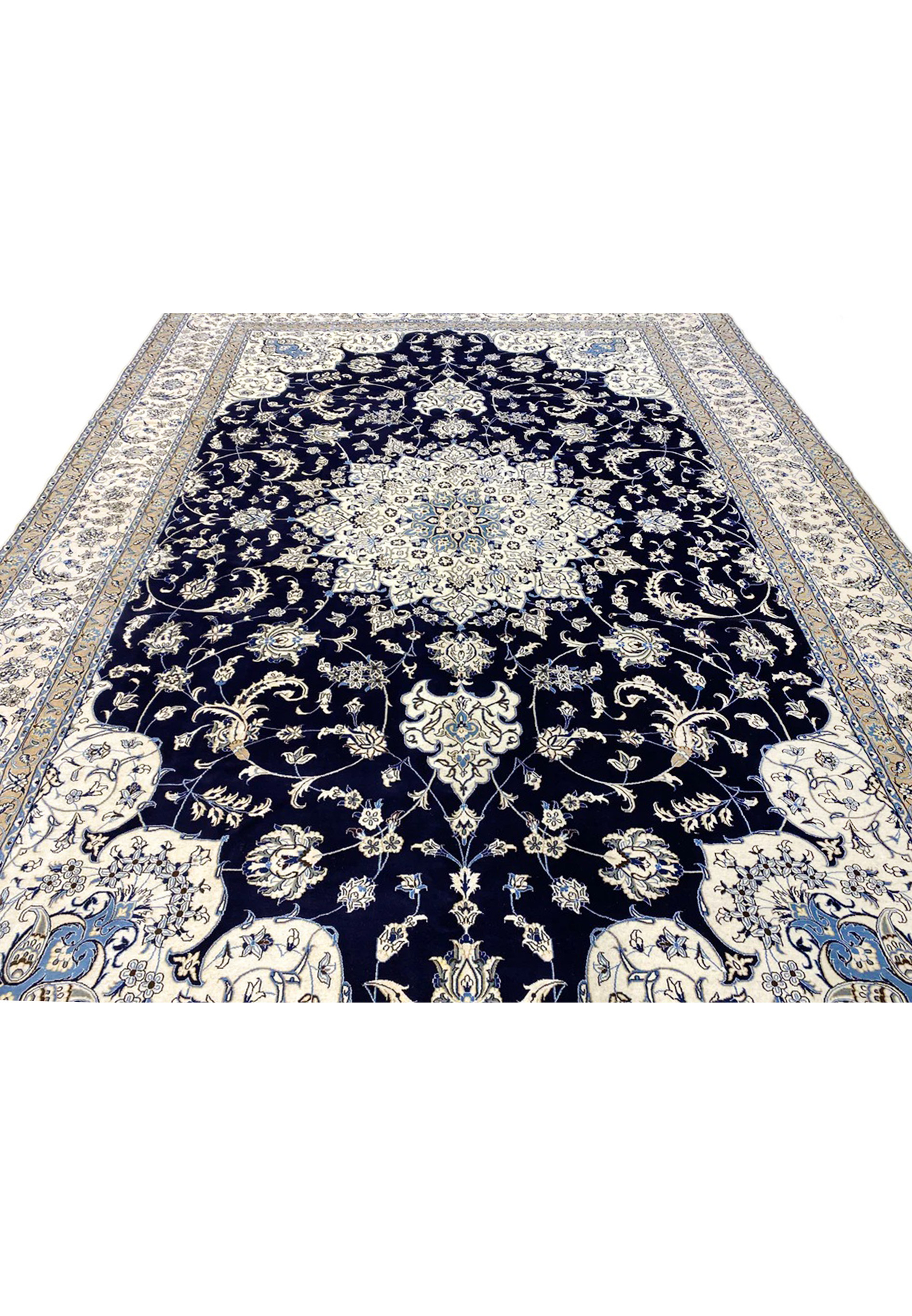 Laid-down view of a 10x19 Persian Nain 9 La rug displaying full medallion layout, navy field, ivory borders, and elegant proportions