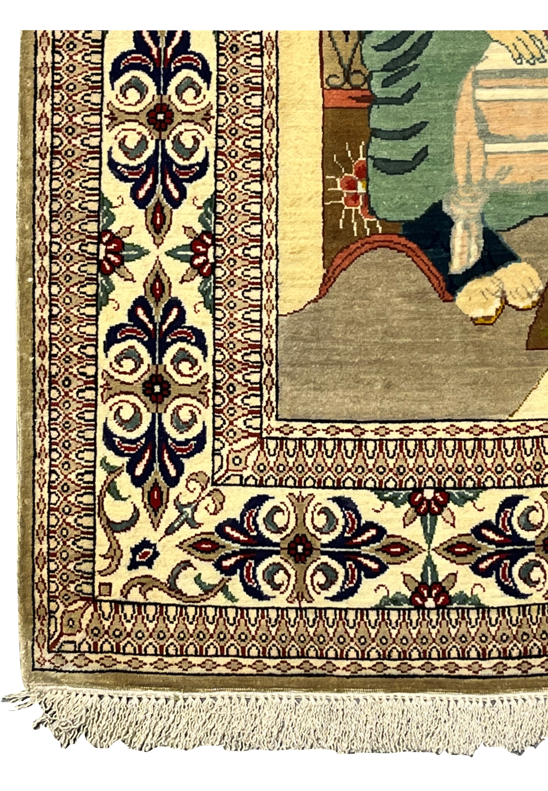 Close-up of border on signed pure silk Persian Qum Pardis rug featuring floral motifs, crisp symmetry, and refined silk craftsmanship