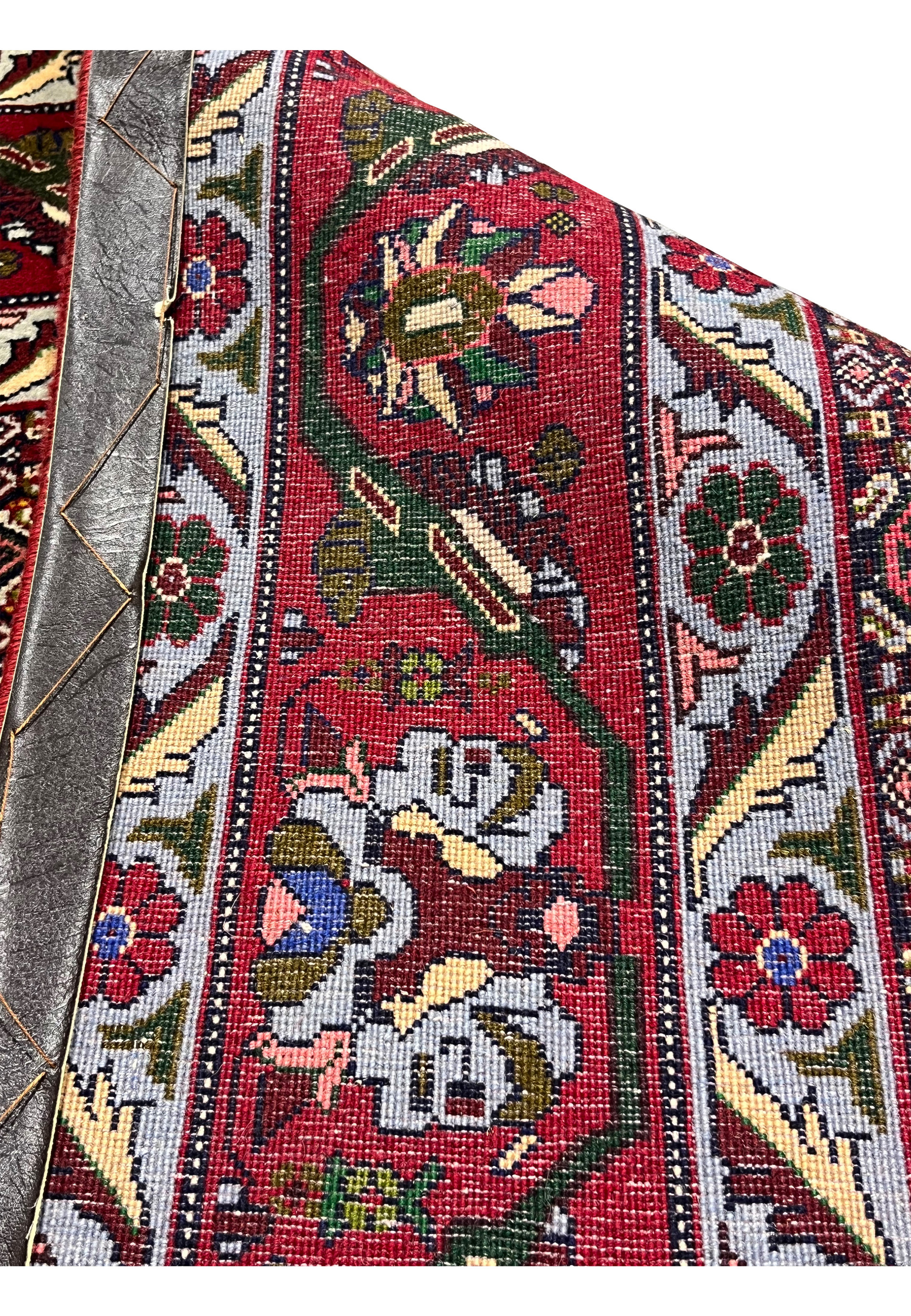 Full backside view of Persian Senneh rug revealing consistent knotting, clean structure, and well-preserved traditional handwoven construction
