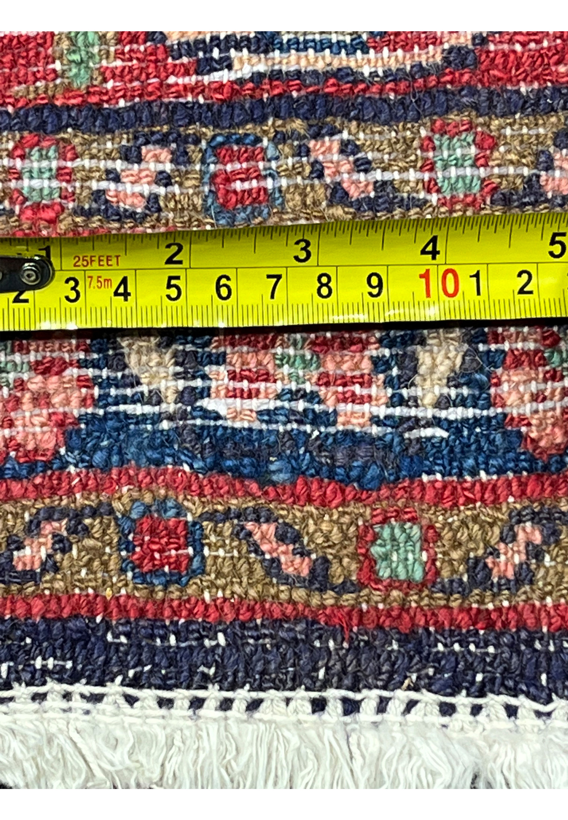 Backside with measuring tape highlighting knot density and scale, showing hand knotted structure and precise craftsmanship of Persian Mahal rug