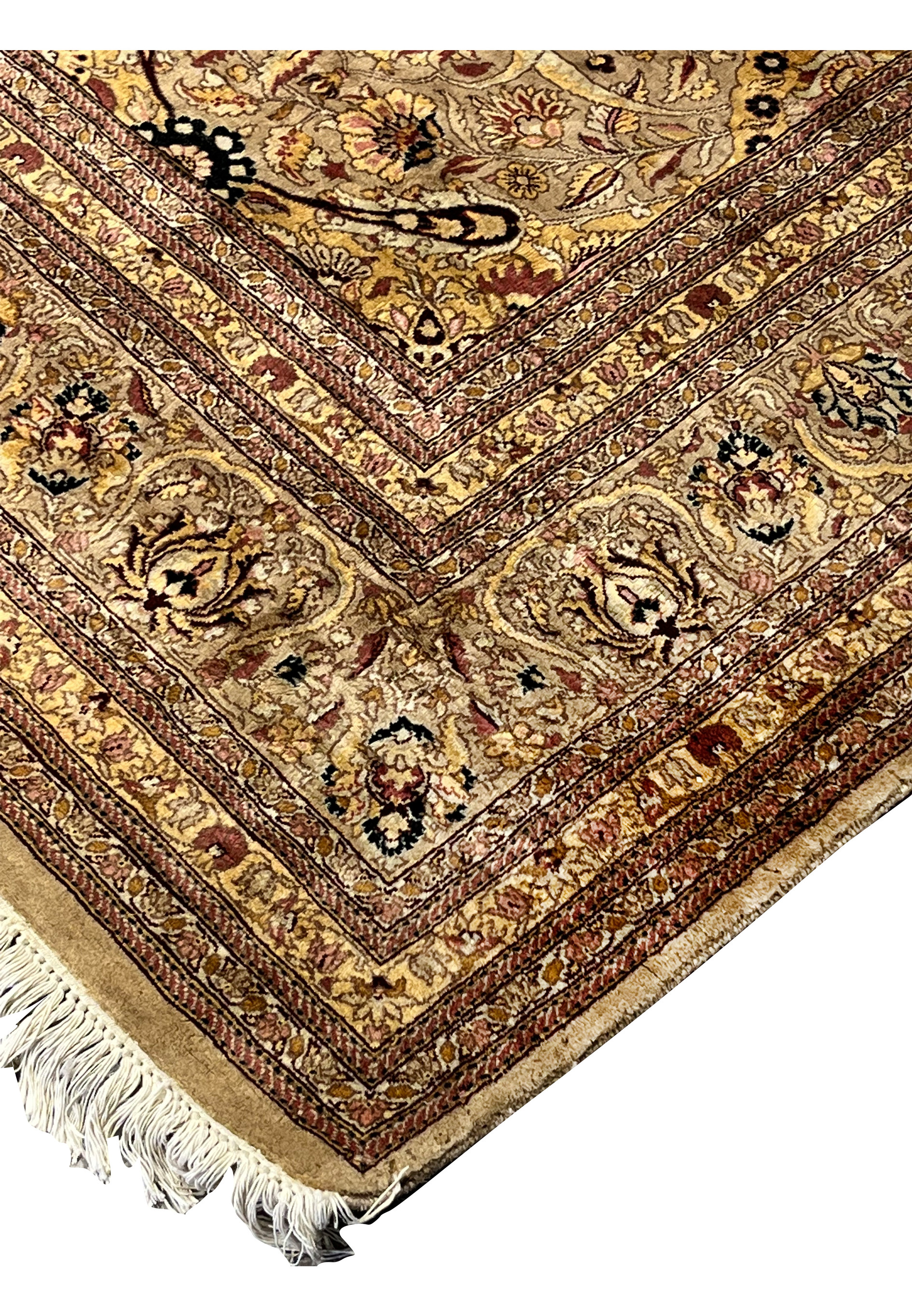 Edge closeup showing fringe, binding, and worn distressed areas along perimeter