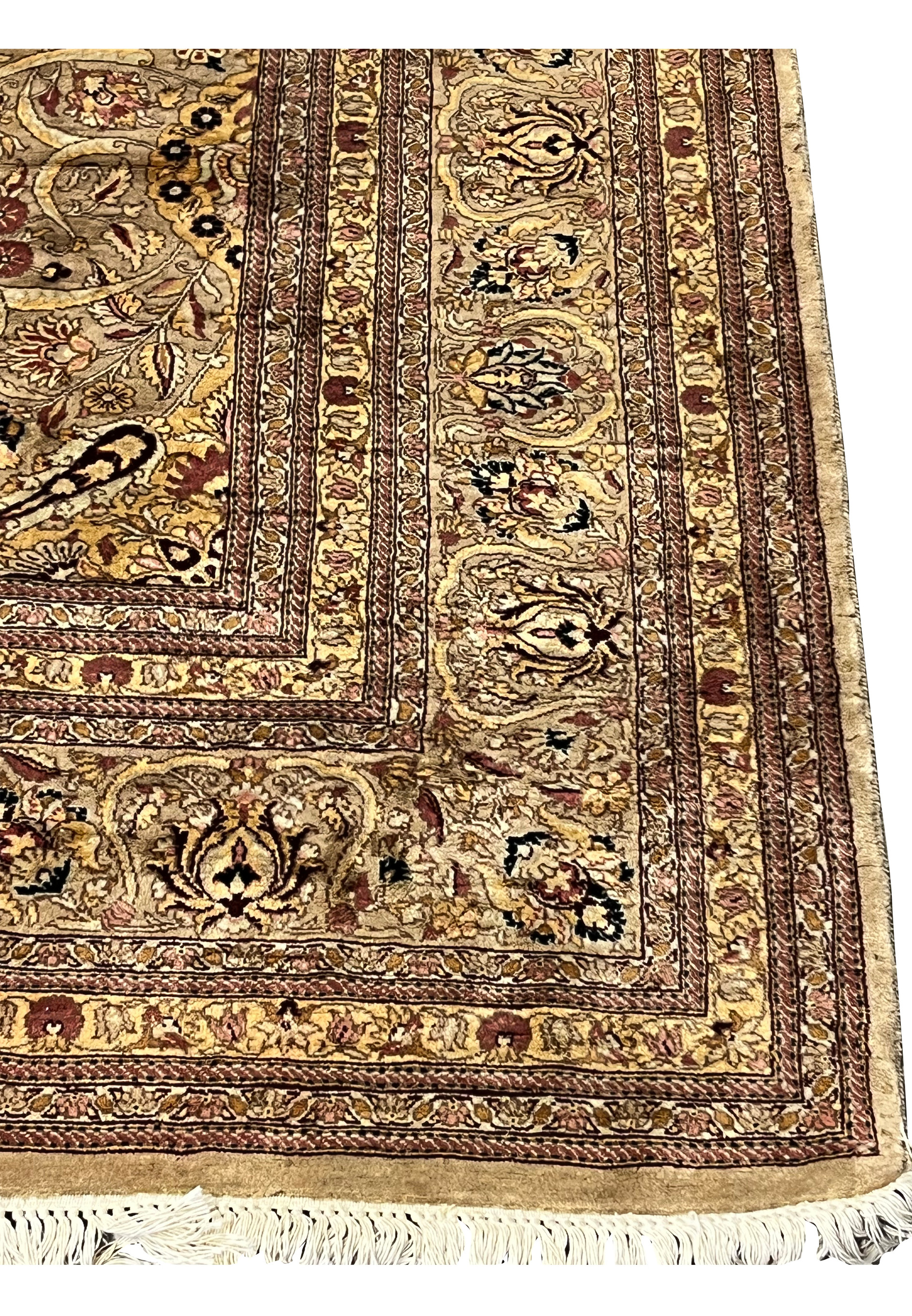 Border detail showing repeating floral cartouches, brown outlines, and antique style guard stripes.