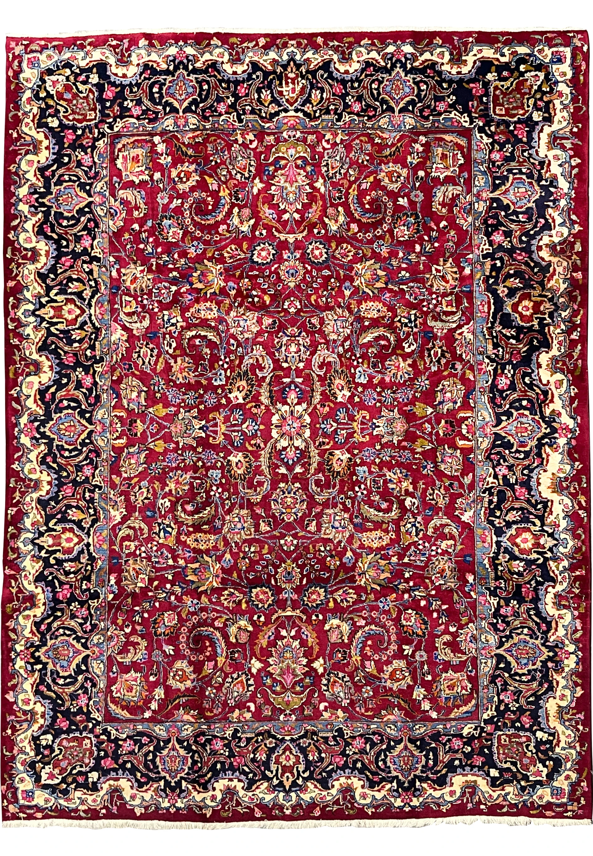 Full view of 8'1 x 11'1 Persian Mashad rug signed Makhmal Baf with brick red field, navy floral borders, and intricate medallion design