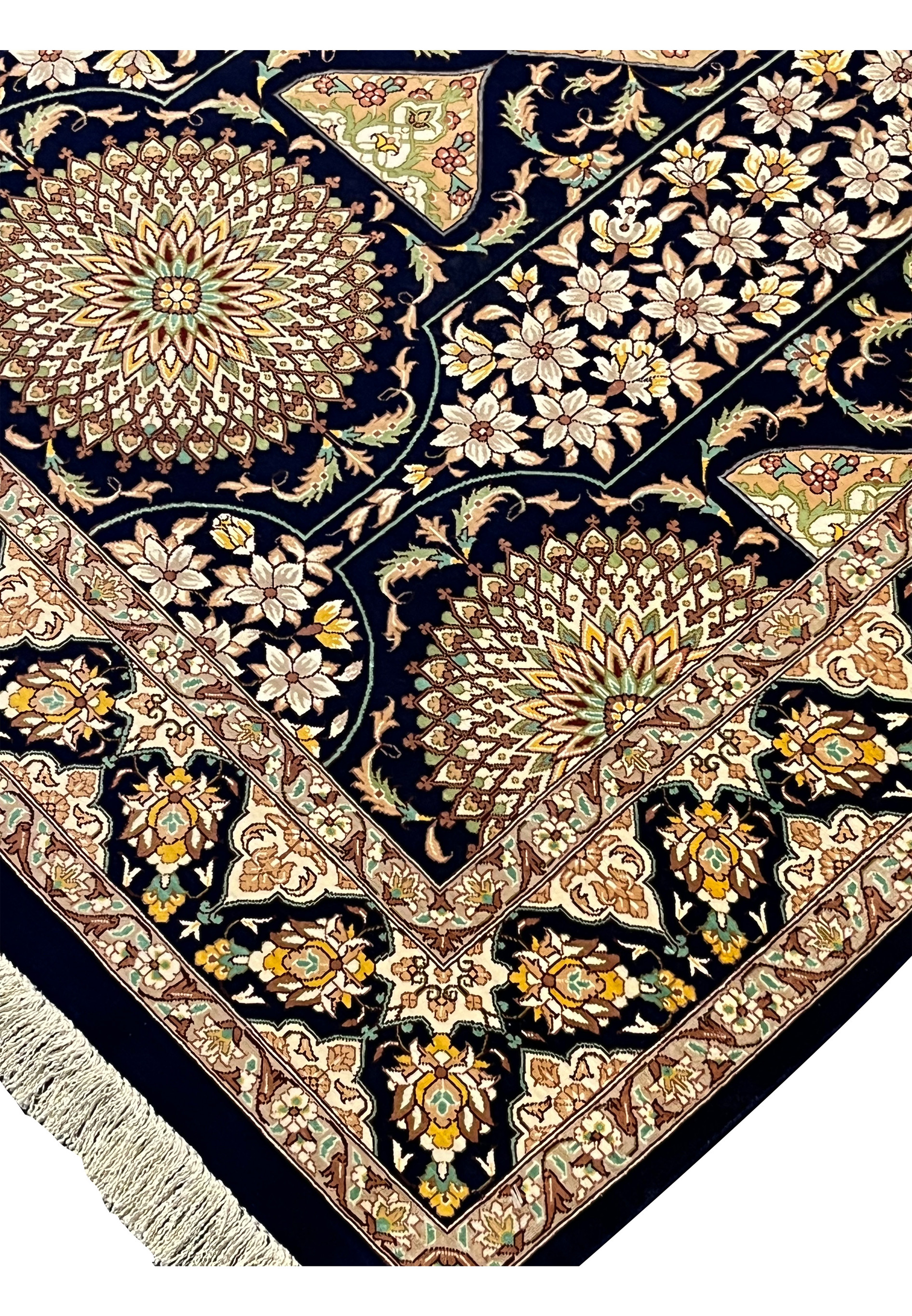 Inner edge and guard border close up with fine silk knots ivory vines navy ground and precise craftsmanship Persian Qum silk rug