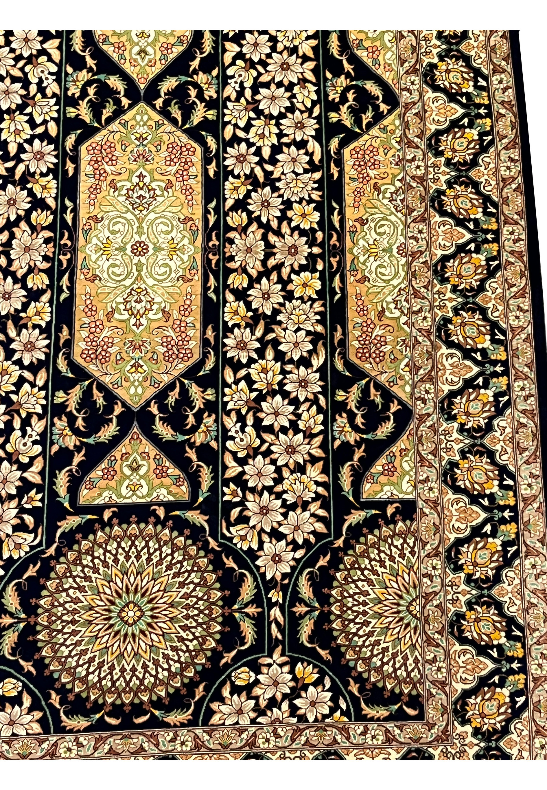 Side perspective highlighting silk pile depth clean edges and border structure luxury navy and gold Persian Qum pure silk handmade rug