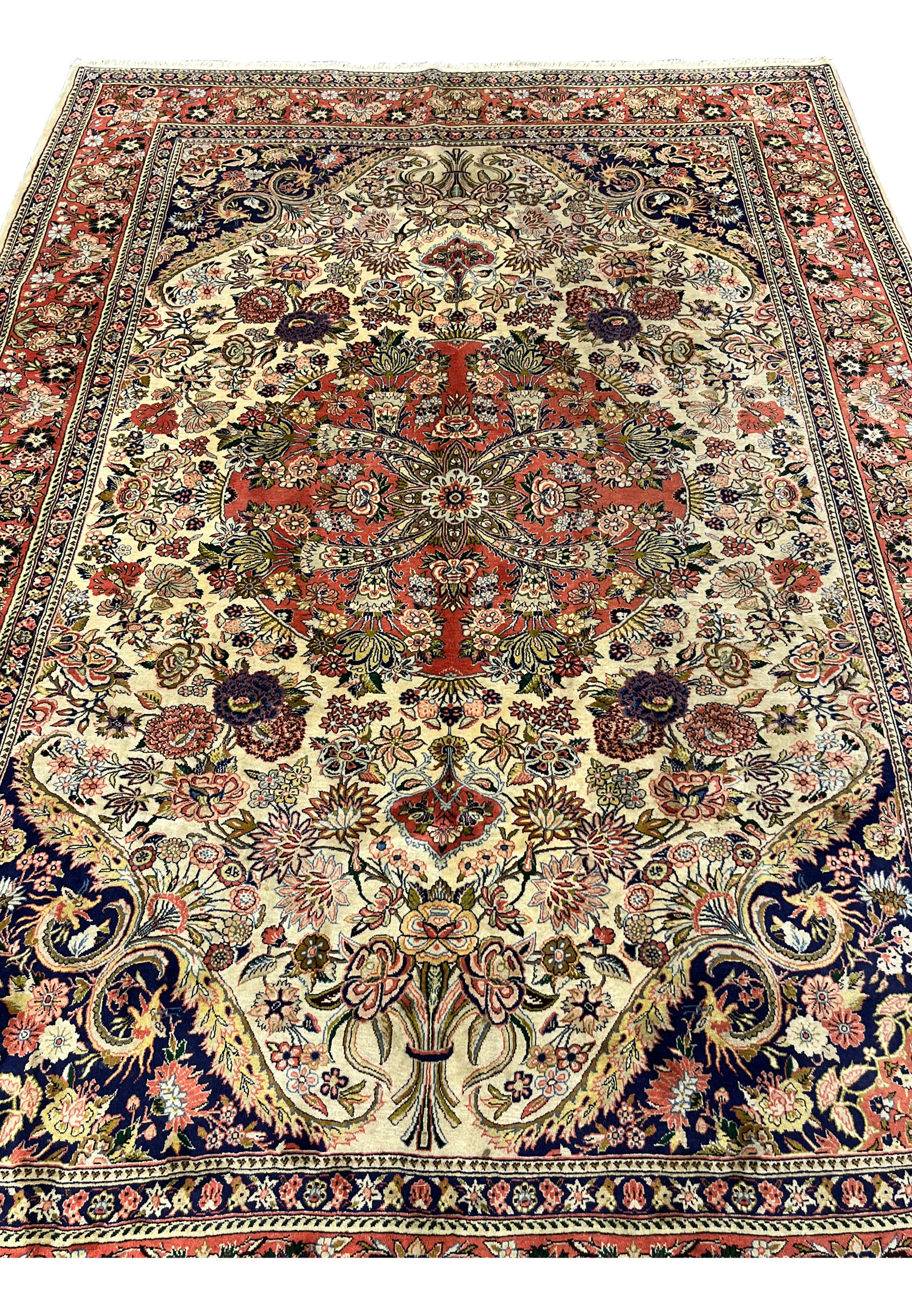 Midfield detail of Persian Bijar rug with intricate floral sprays ivory background and 500 KPSI tight knot structure
