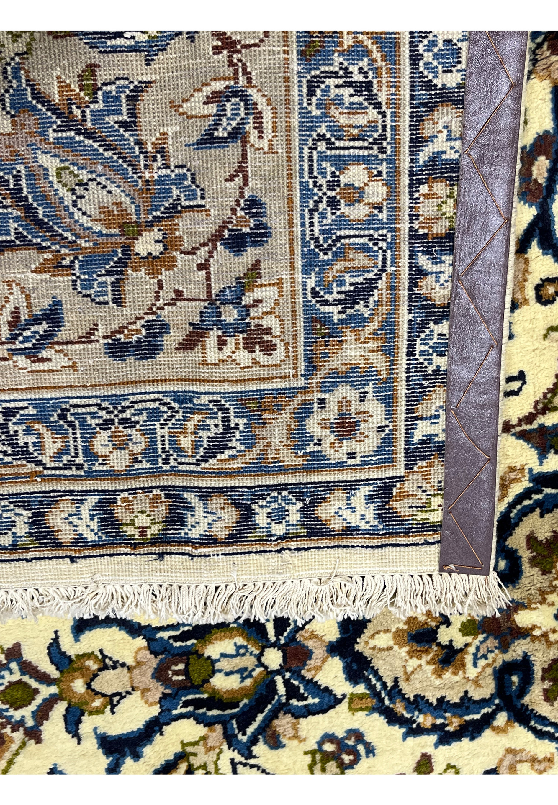 Backside view of 10'2 x 14'3 Persian Kashan rug revealing hand knotted wool construction detailed pattern clarity and durable foundation