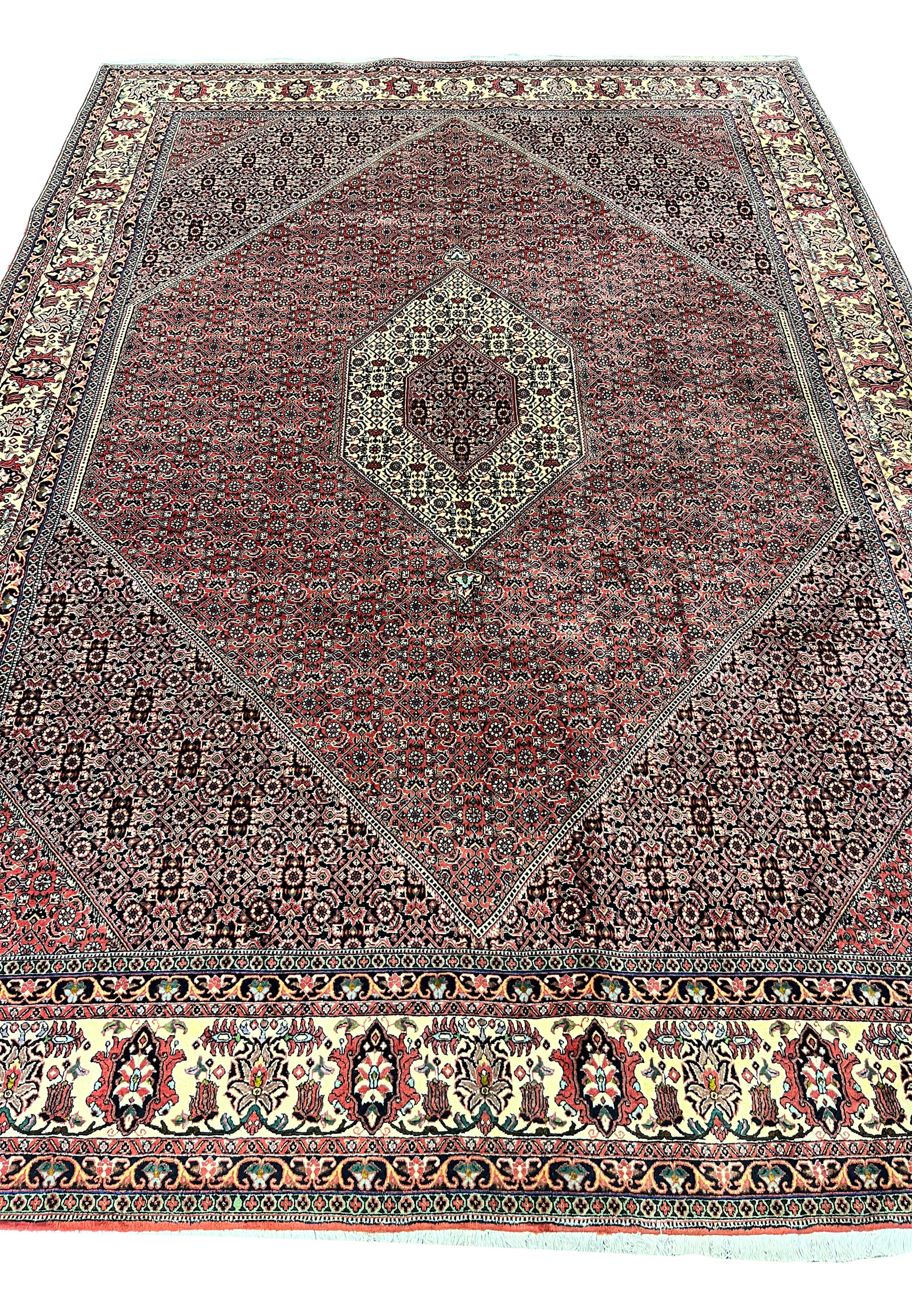 Top view of 8'2 x 11'4 Persian Bijar Iron Rug in deep red and ivory, detailed medallion center and intricate geometric floral field