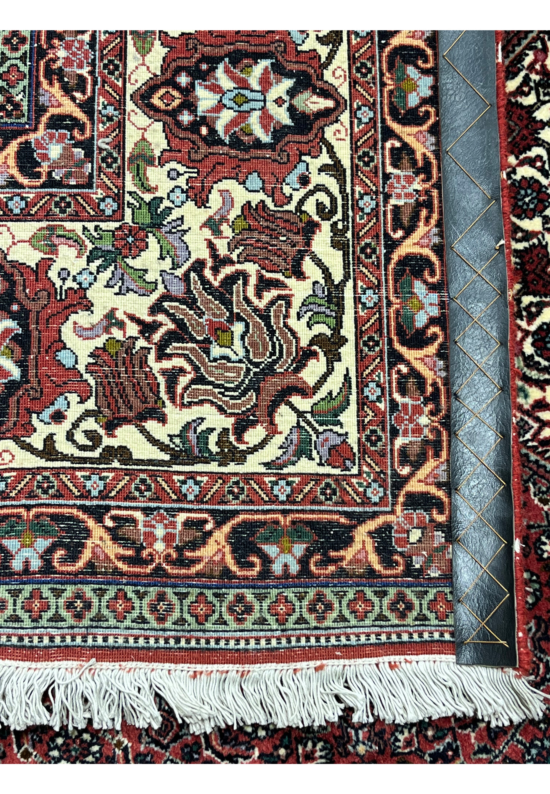 Backside view of 8'2 x 11'4 Persian Bijar Iron Rug displaying tight knot density, clear pattern definition and strong wool foundation