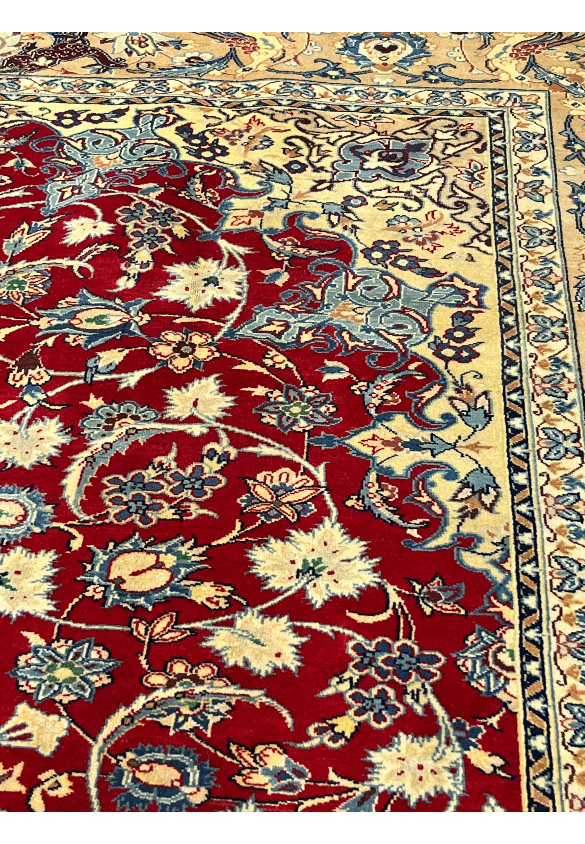 Pattern detail 10x13 Persian Isfahan wool rug crimson red field ivory floral blooms blue scrollwork handmade Persia
