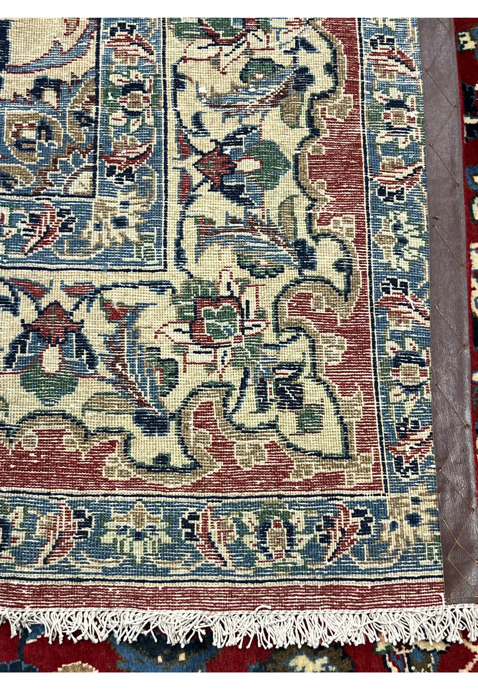 Backside 8x12 Persian Isfahan wool rug hand knotted cotton foundation crisp floral pattern visible through weave