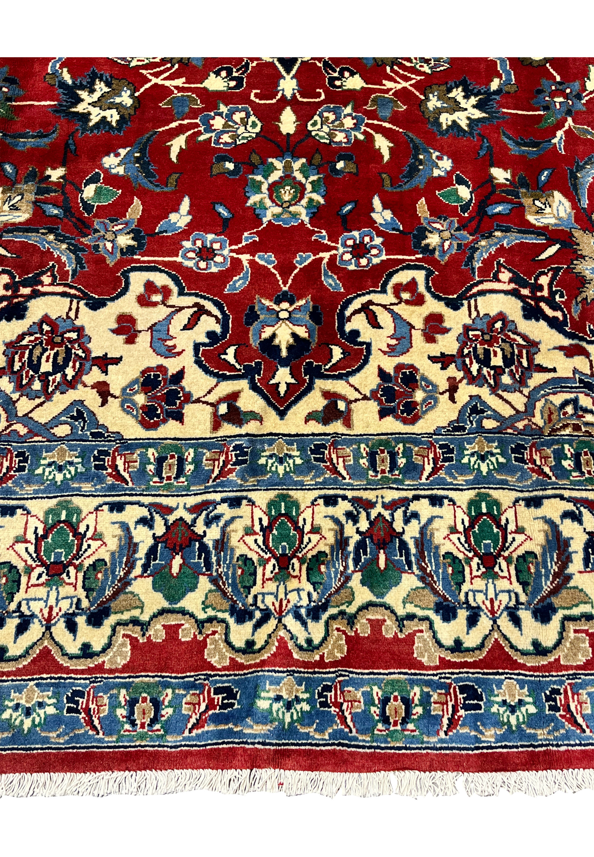 Lower border detail 8x12 Persian Isfahan wool rug ivory ground green blue floral scrollwork crimson red field fringe