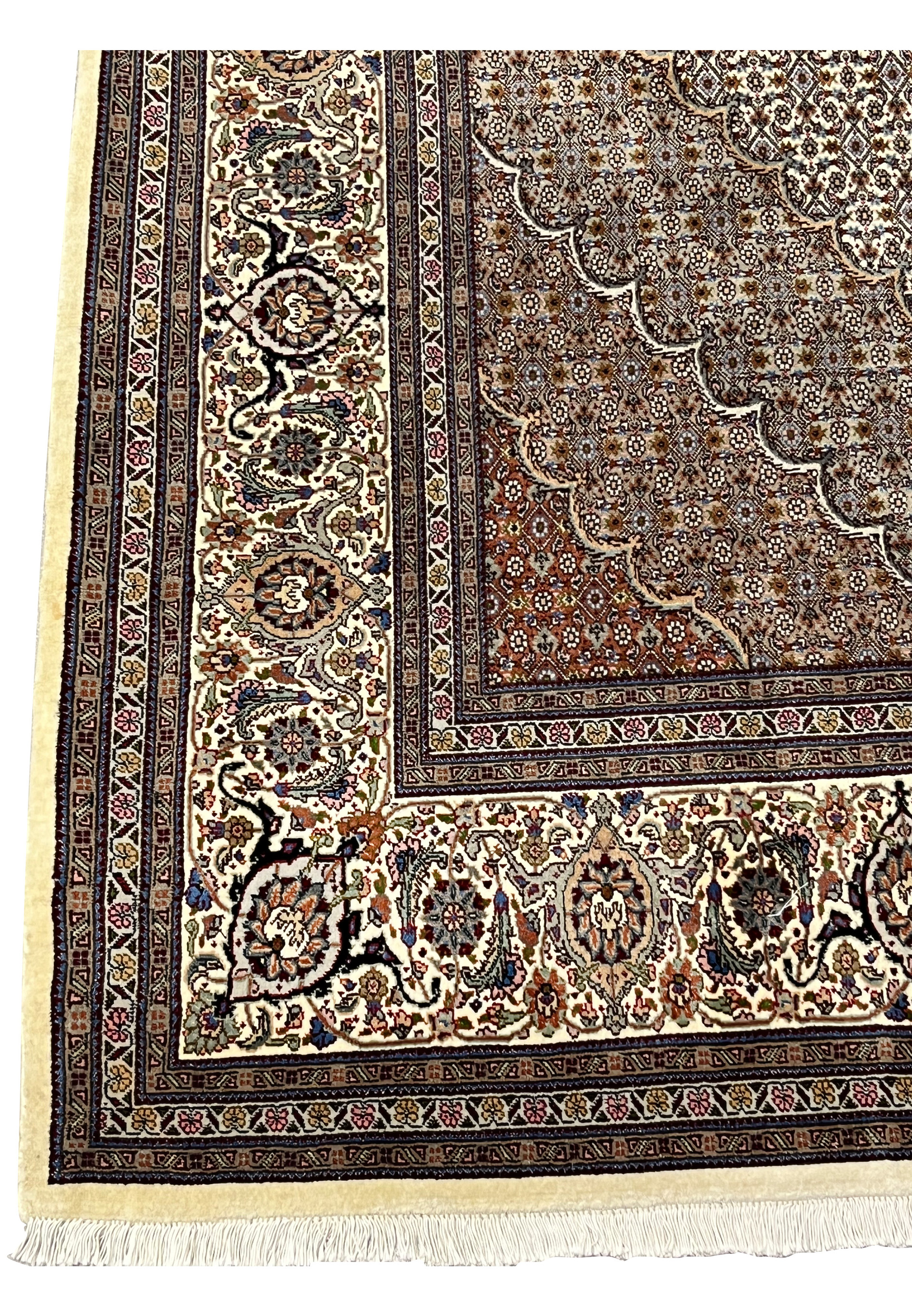 Border corner detail Persian Tabriz Mahi 50 Raj wool silk rug ivory ground floral palmette scrollwork navy surround