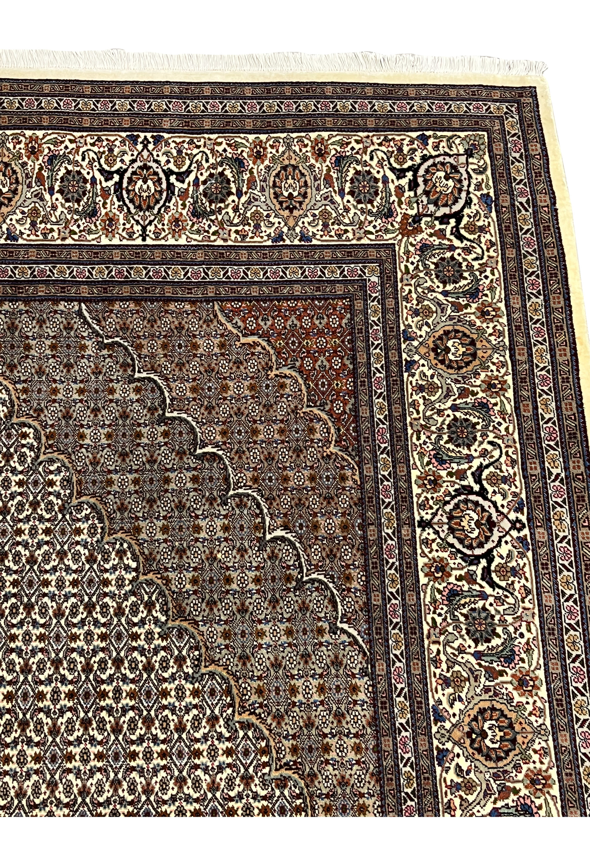 Upper border detail Persian Tabriz Mahi 50 Raj wool silk rug ivory ground floral scrollwork navy guard herati field