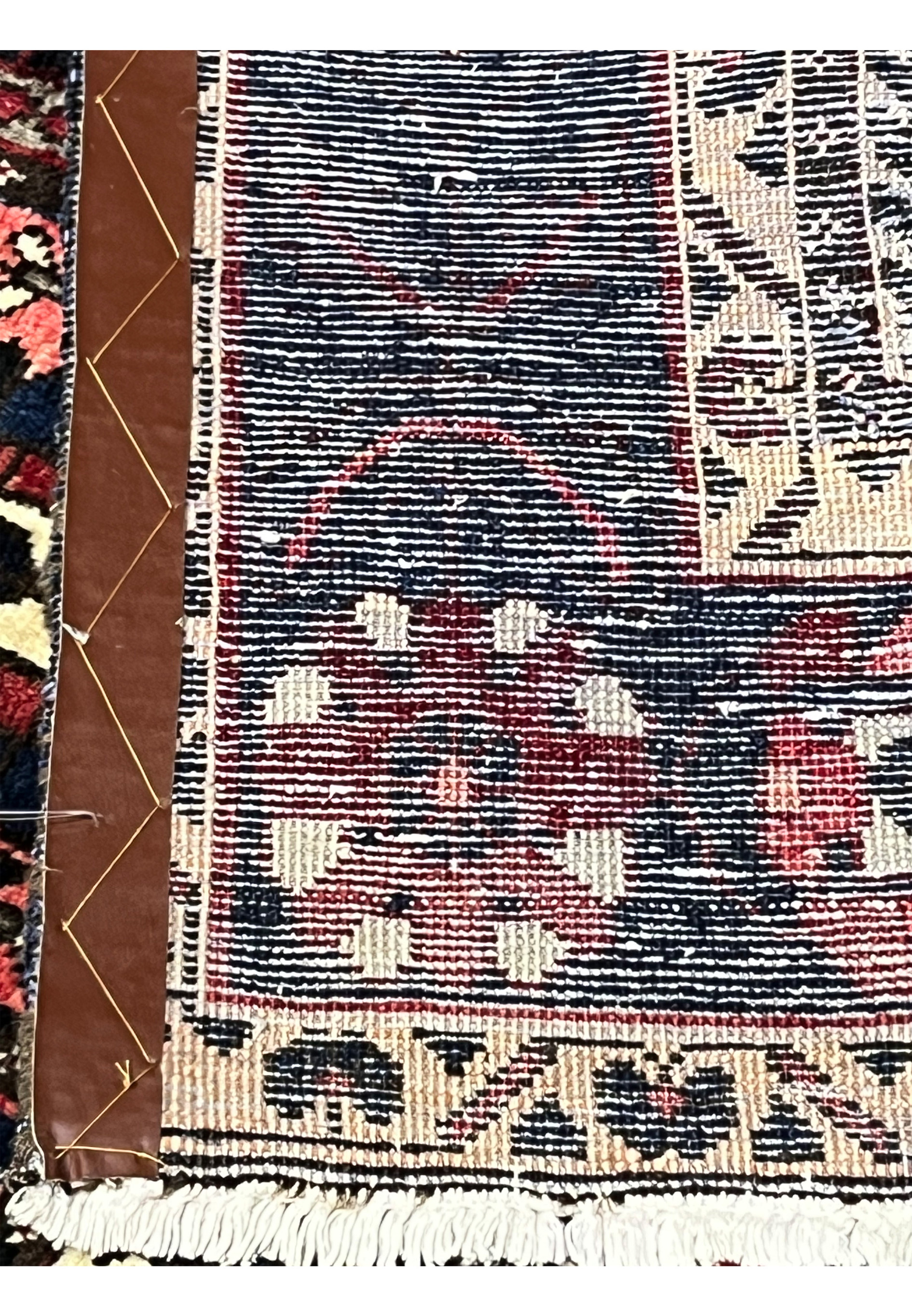 Back side of 7x10 Persian Bakhtiari panel rug showing hand-knotted wool construction