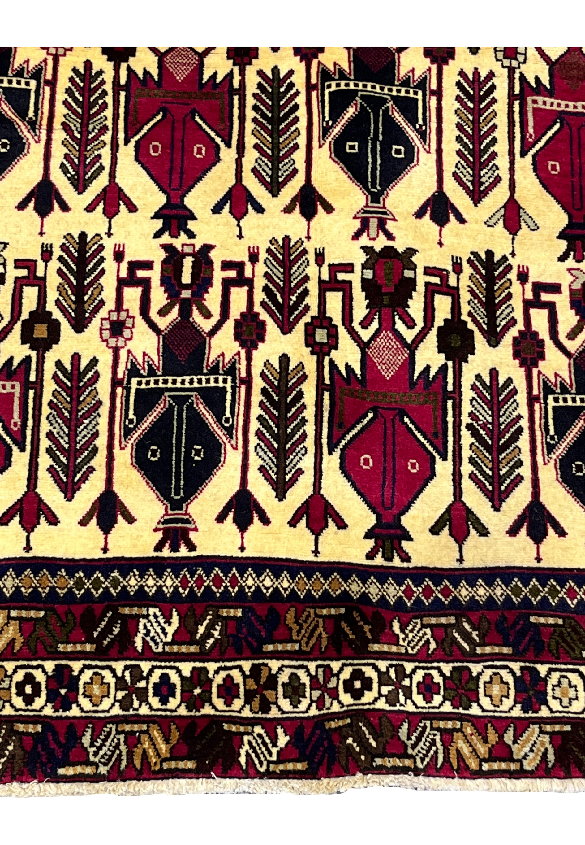 Lower border of 5x8 Persian Afshar rug showing ivory floral band and dark navy outer border