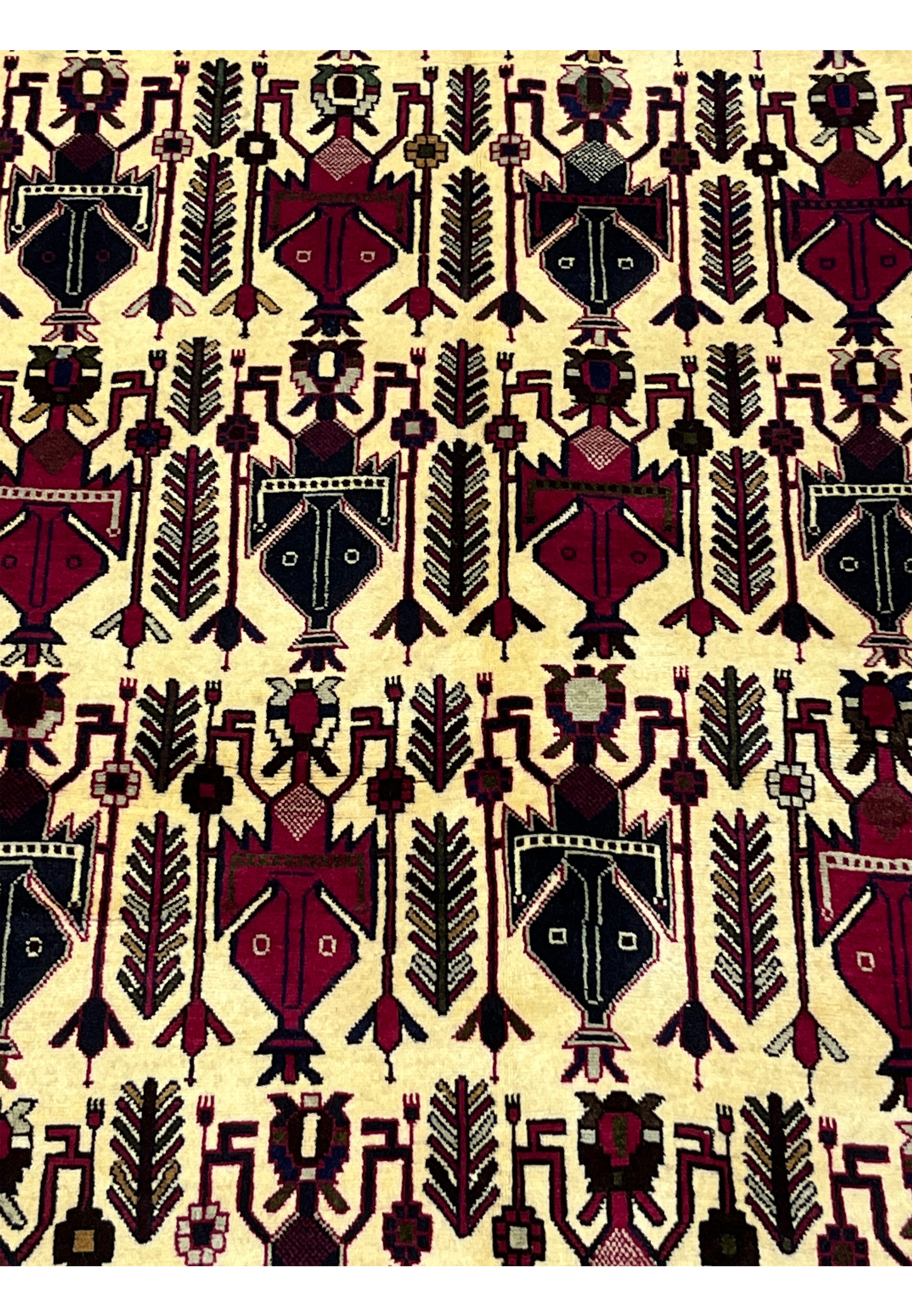 Pattern and motif detail of 5x8 Persian Afshar tribal rug with vase tree and boteh forms