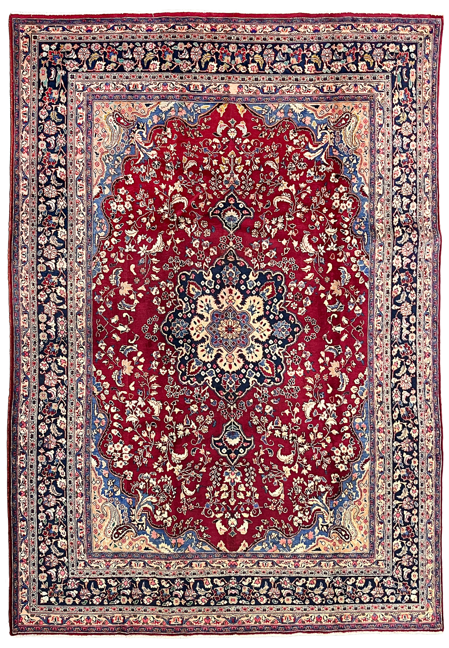 10x13 distressed antique Persian Mashad rug red field navy border floral medallion full view