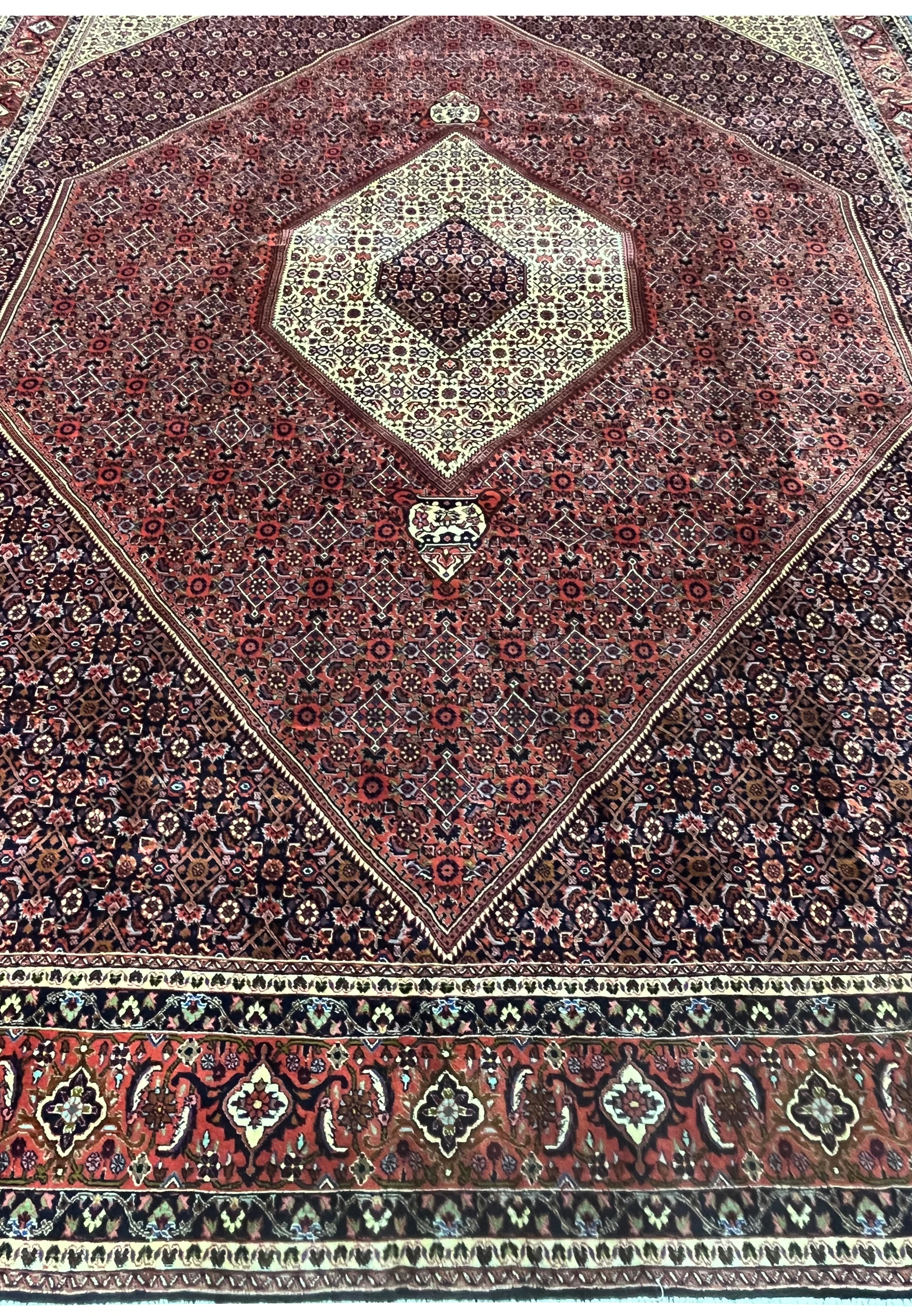 Red Persian rug with ivory hexagonal medallion, 10x13 hand-knotted wool from Bijar