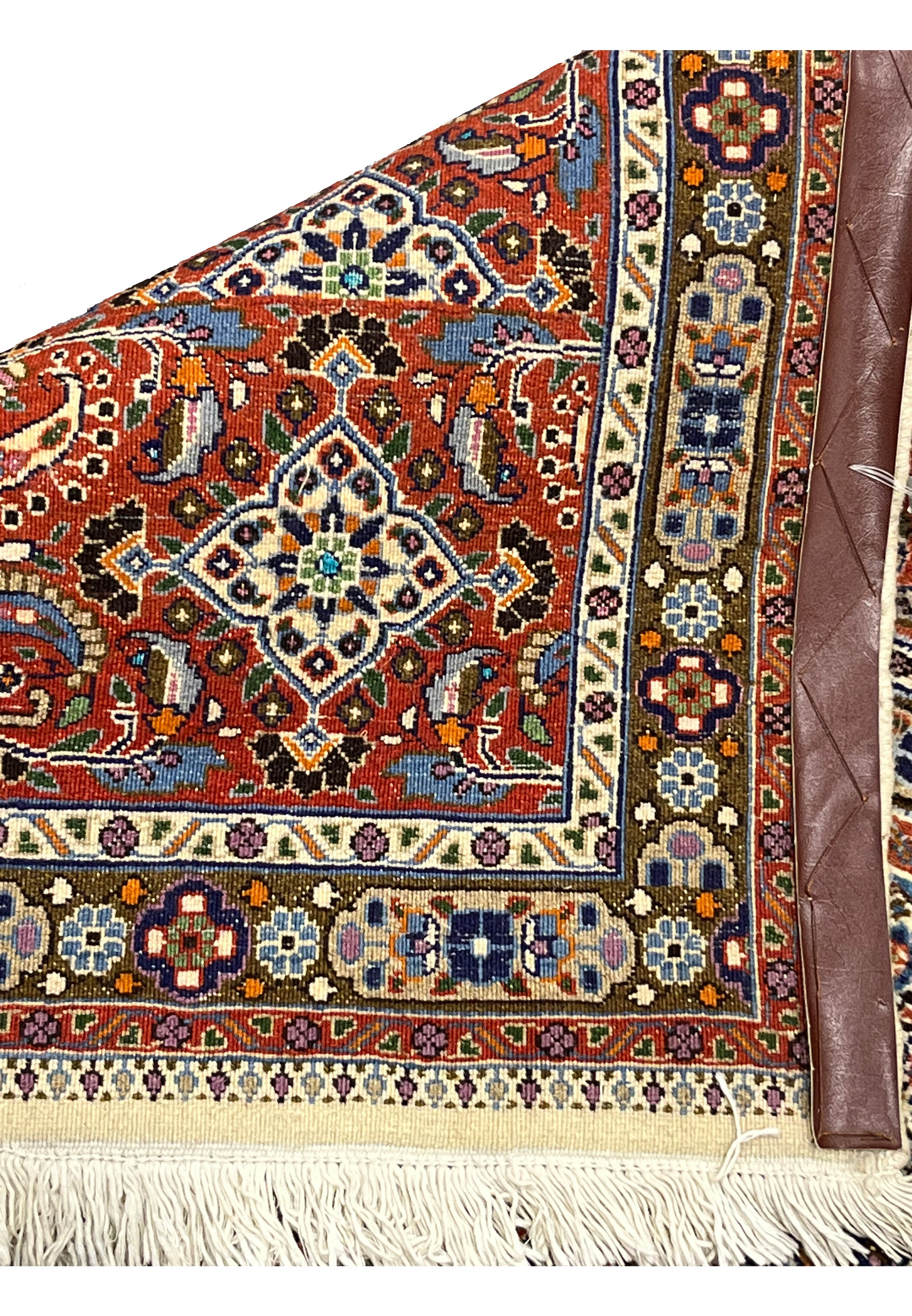 Back of handmade Persian Moud rug showing tight hand-knotted weave and cotton foundation