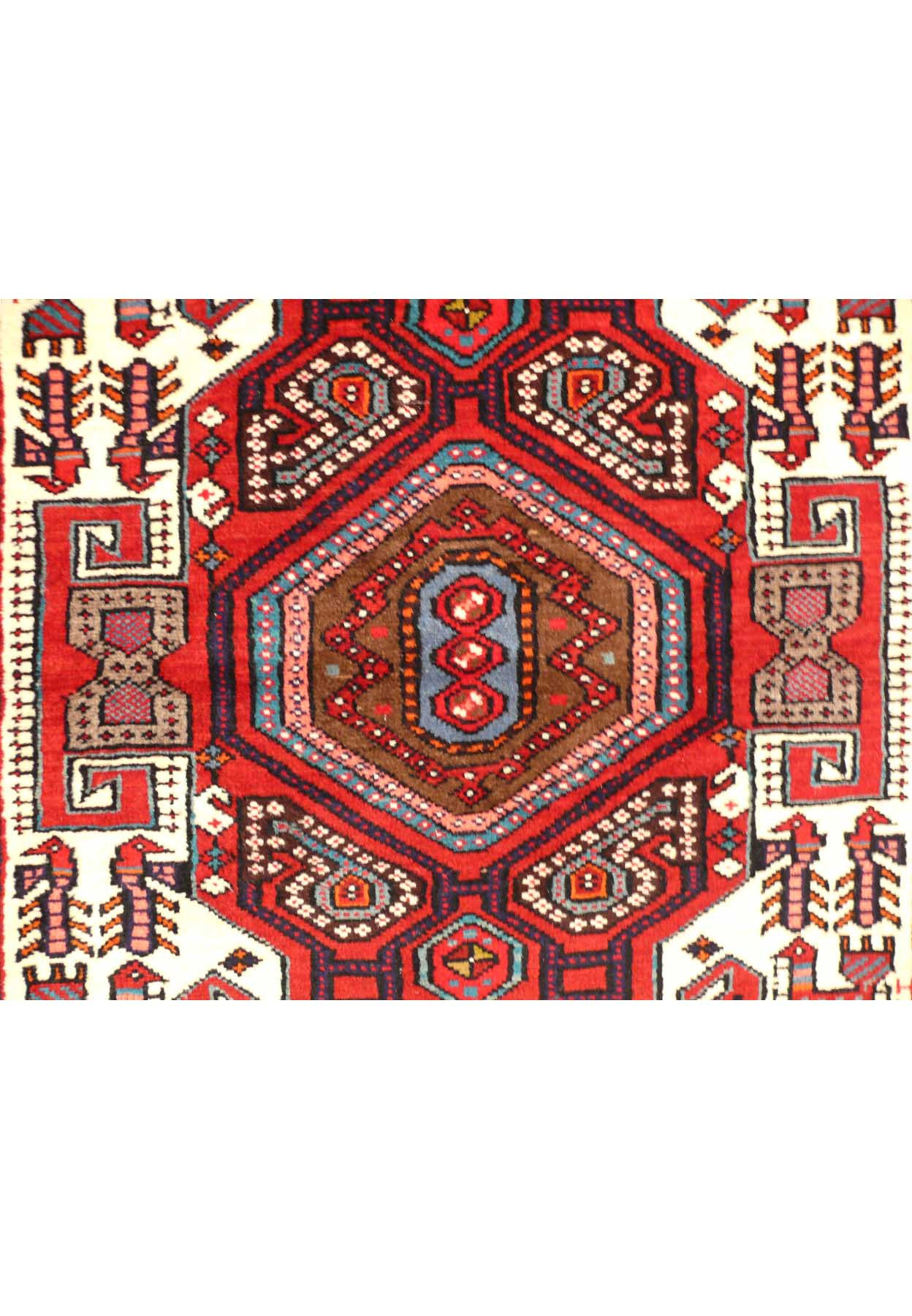 Close-up of the intricate tribal motifs on the Persian Shahsawan rug