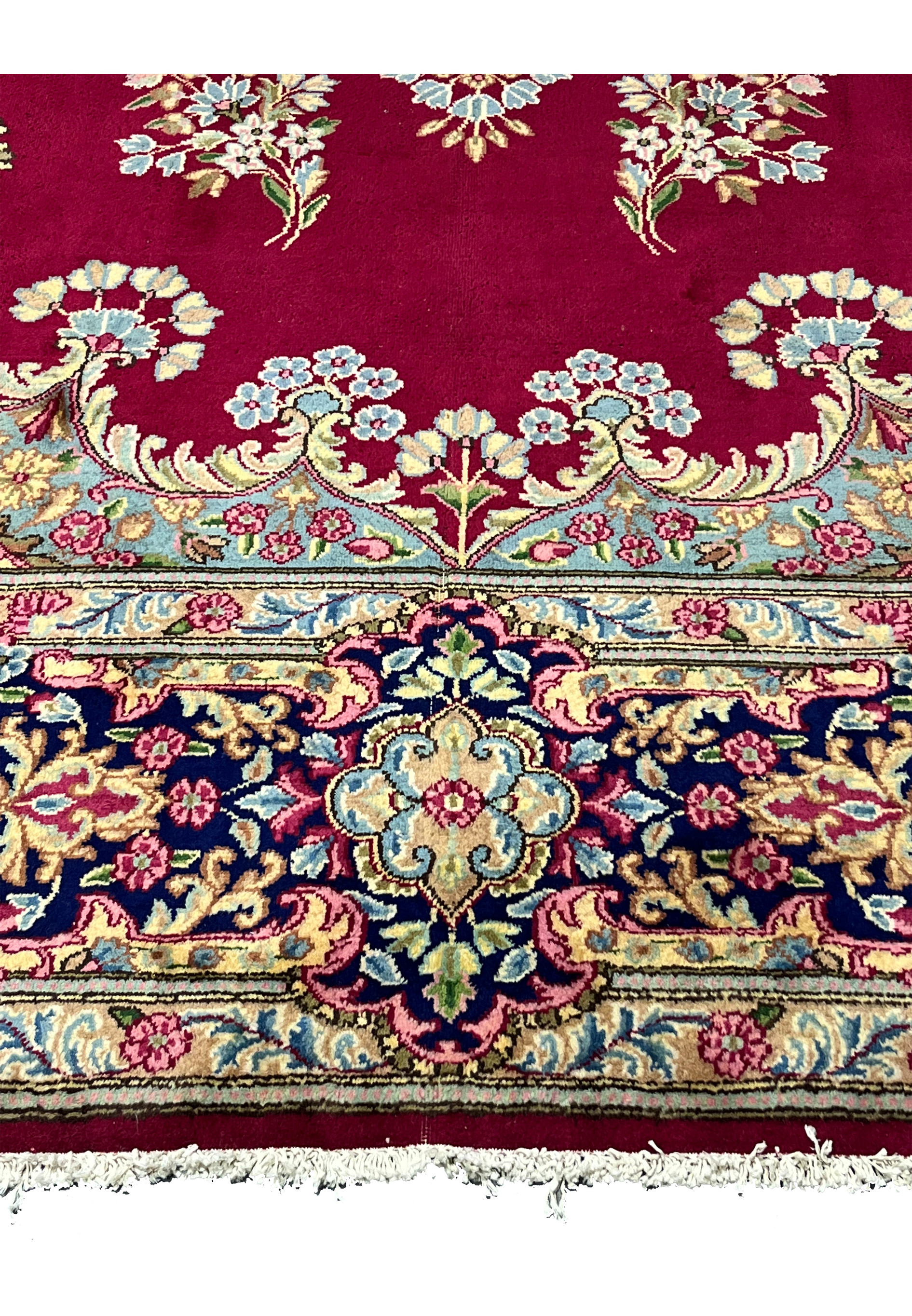 10x14 Persian Kerman rug lower border navy floral vine ivory fringe detail