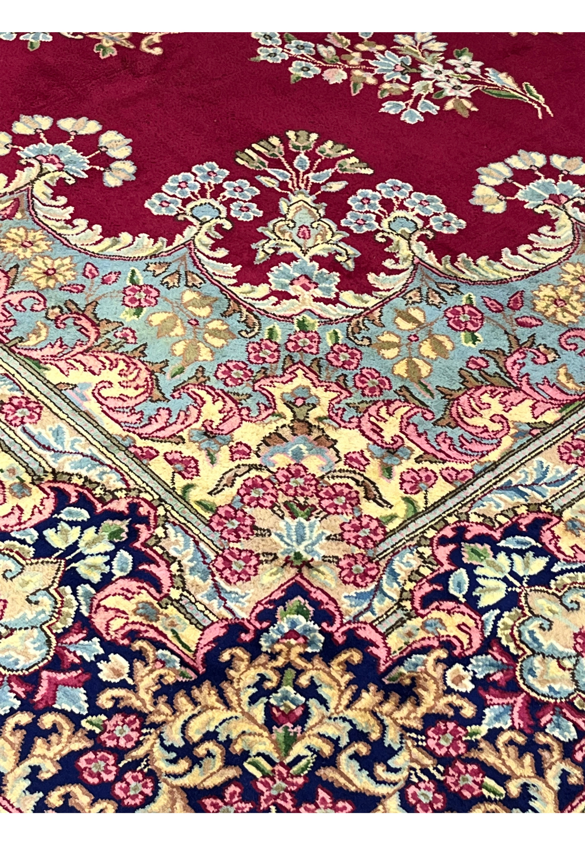 10x14 Persian Kerman rug inner border powder blue ivory floral detail