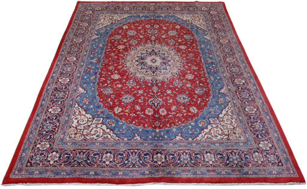 Aerial view of the entire 10x13 Persian Sarough rug, highlighting its intricate patterns and rich color palette