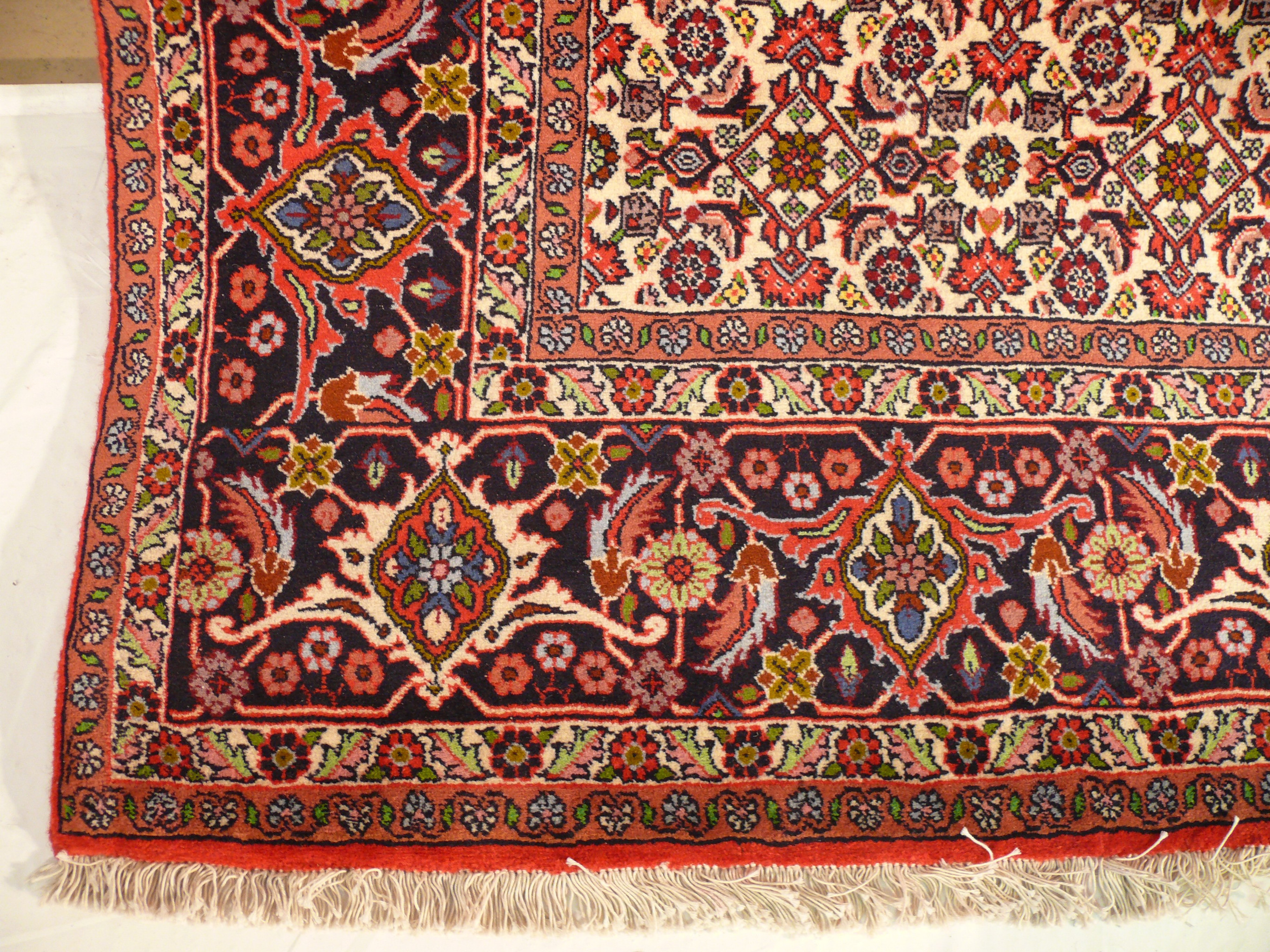 Corner detailing of the 6'7 x 9'9 Persian Bijar Iron Rug illustrating its craftsmanship.