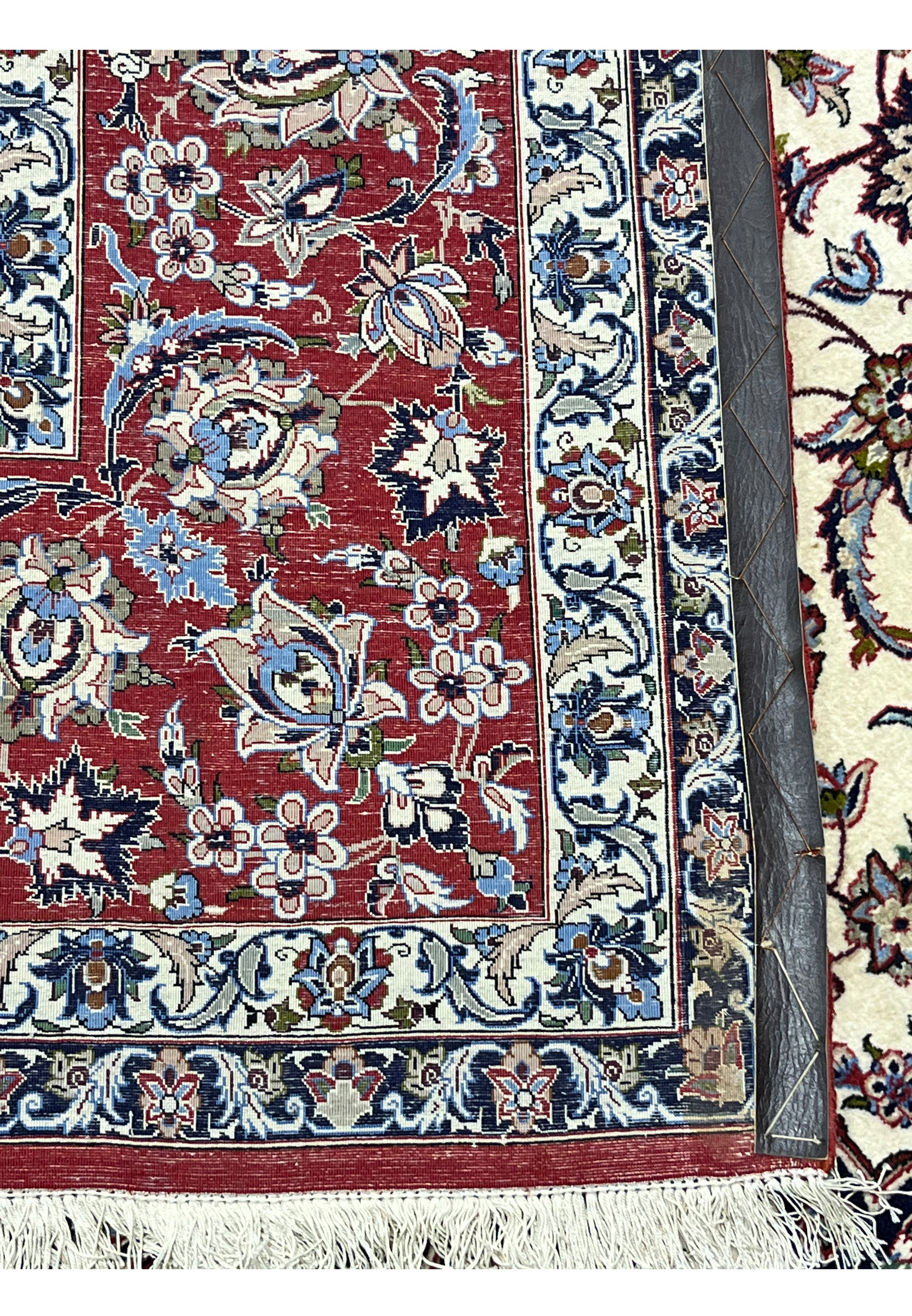 Backside 8x12 premium Persian Isfahan wool silk rug hand knotted cotton foundation crisp floral pattern visible through weave