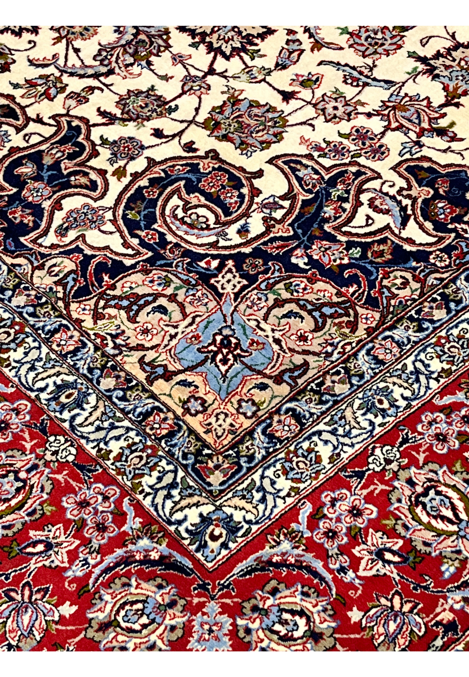 Inner border detail 8x12 premium Persian Isfahan wool silk rug navy blue arabesque scrollwork ivory field crimson surround