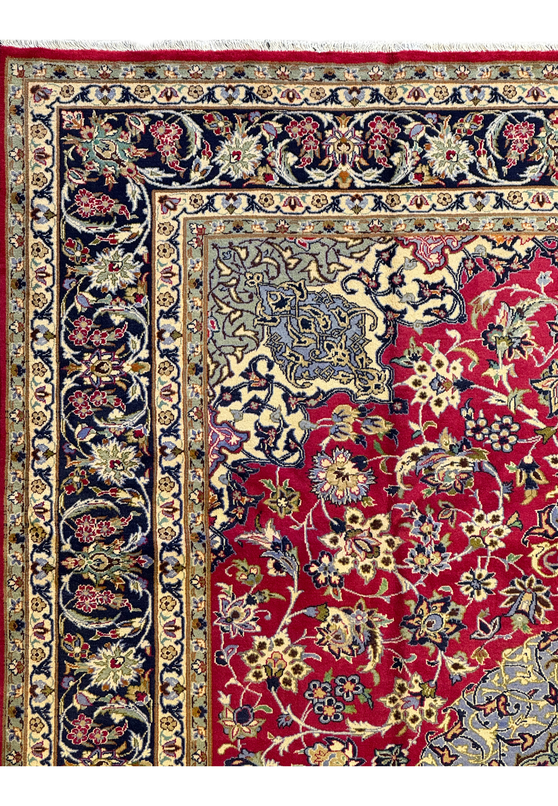 Corner detail of Persian Isfahan Rug highlighting the fringe and intricate border design.