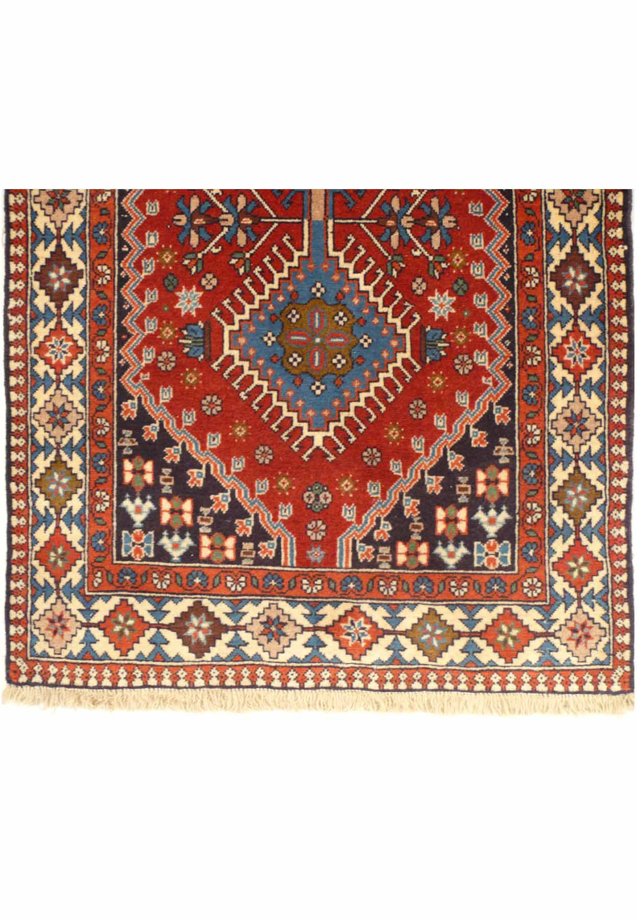 Detailed corner view of the 3' x 14' Persian Geometric Yalameh Rug