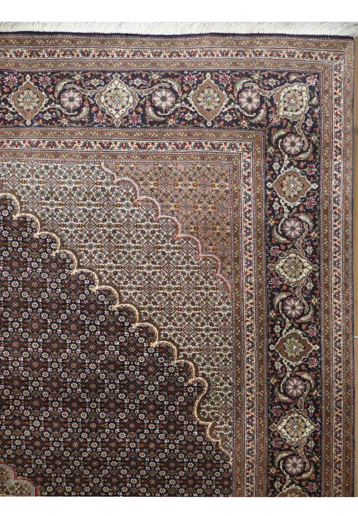 Detailed view of the elaborate border pattern on the 7' x 10' Persian Tabriz Mahi Rug
