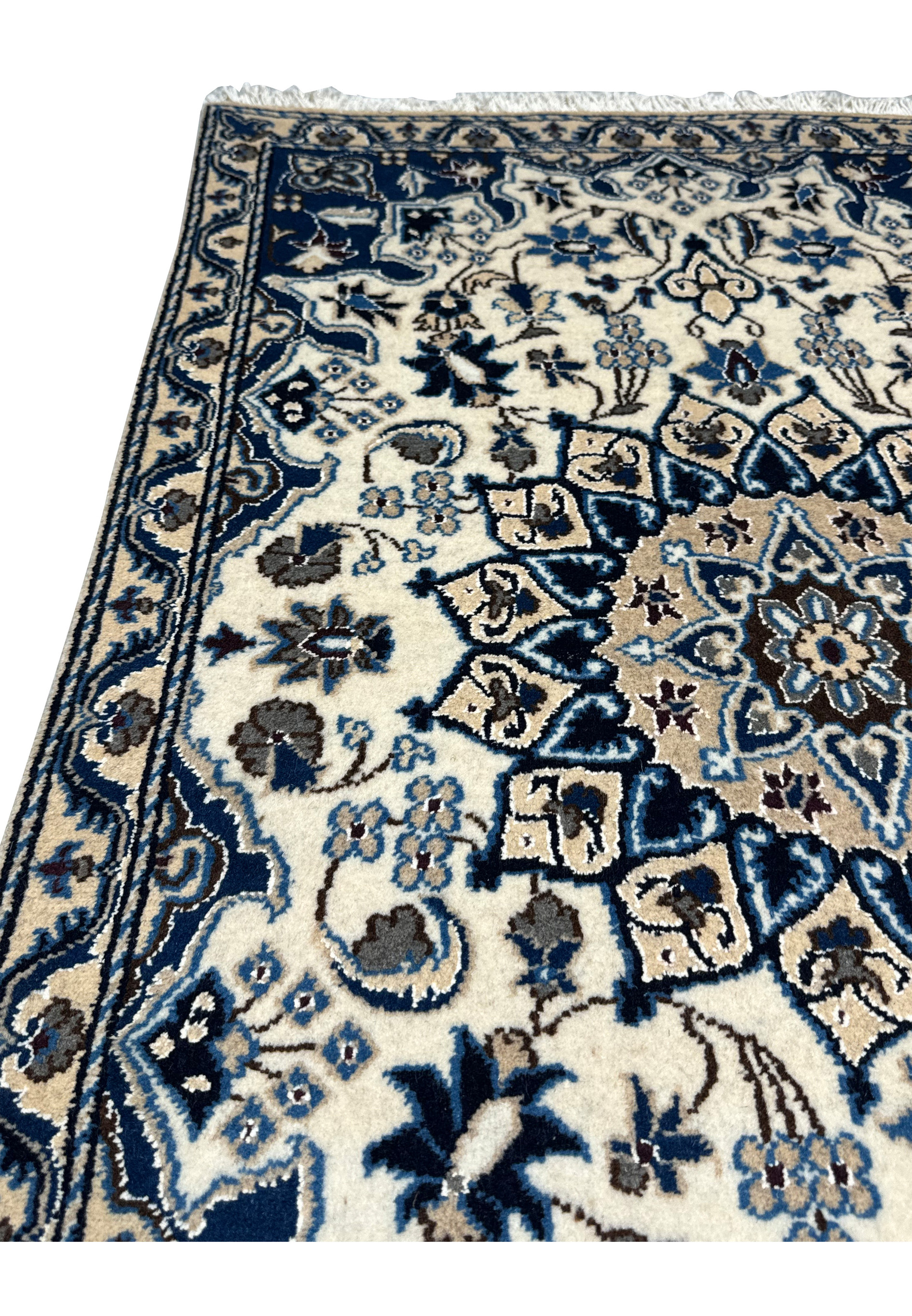 Midfield floral design of Persian Nain rug with wool and silk pile.