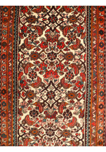 Close-up of the intricate patterns and vibrant colors on the Persian Rudbar Runner.