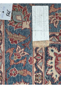 Antique Mashad Rug label close-up, confirming the authenticity and dimensions of the 3x5 handwoven piece.