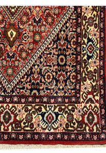 A feast for the eyes! Revel in the vibrant hues of our Bijar rug - a kaleidoscope of colors that brighten any room in this 3x5 size.