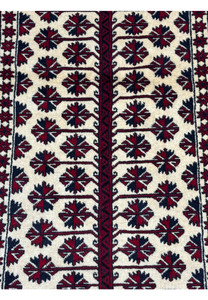 Close-up of the intricate geometric patterns and tribal motifs on the Persian Baluch Prayer Rug