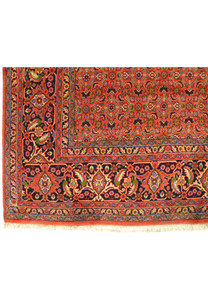 Detailed view of the Persian Bijar Rug's elaborate border with cream and navy accents