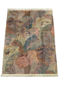 Full view of a large Modern Art Deco Beijing rug laid flat, displaying an intricate leaf design in shades of brown, green, and blue with a textured fringe