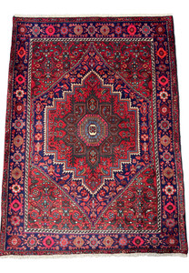 Overhead perspective of a 3'4" x 4'8" Persian Gholtogh rug, highlighting the complex interplay of colors and traditional Persian motifs