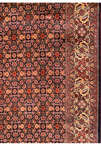 Angle shot of Persian Bijar Rug, illustrating the depth of design and color vibrancy