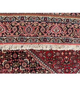 Detail backside of the 4x6 Persian Bijar rug with intricate patterns and fringed edges