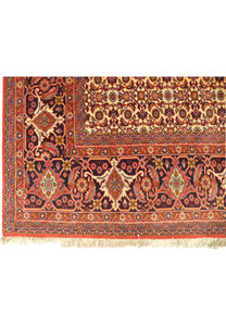 The underside of the Persian Bijar Iron Rug, showing the sturdy construction and the reverse pattern visible through the tight weave, indicative of the rug's quality.