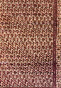 Close-up of the central field of a Persian Moud Rug, focusing on the detailed Herati patterns intertwined in a repetitive, elegant design with red and blue hues