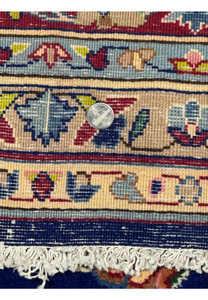 Detailed view of the edge of a Persian Kerman Rug, showing the intricate border design and the high-quality craftsmanship that characterizes this rare piece.