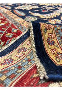 Close-up of the edge of a Ziegler rug, showing the high-quality weave and detailed border patterns.