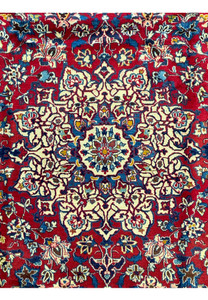 Detailed shot of the center medallion of this 10x13 Isfahan Persian Rug