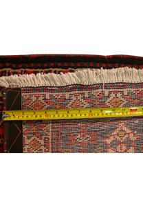 Detailed look at the underside of the Persian Bakhtiar runner rug, highlighting the dense weave and high-quality construction. The natural wool fibers and tight weaving technique contribute to the rug's durability and longevity.